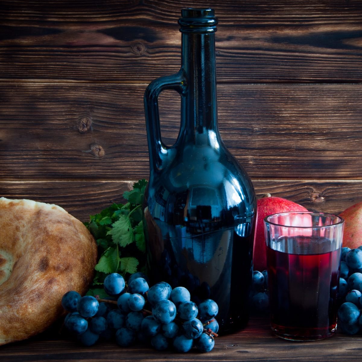 Traditional Georgian wine with grapes and bread