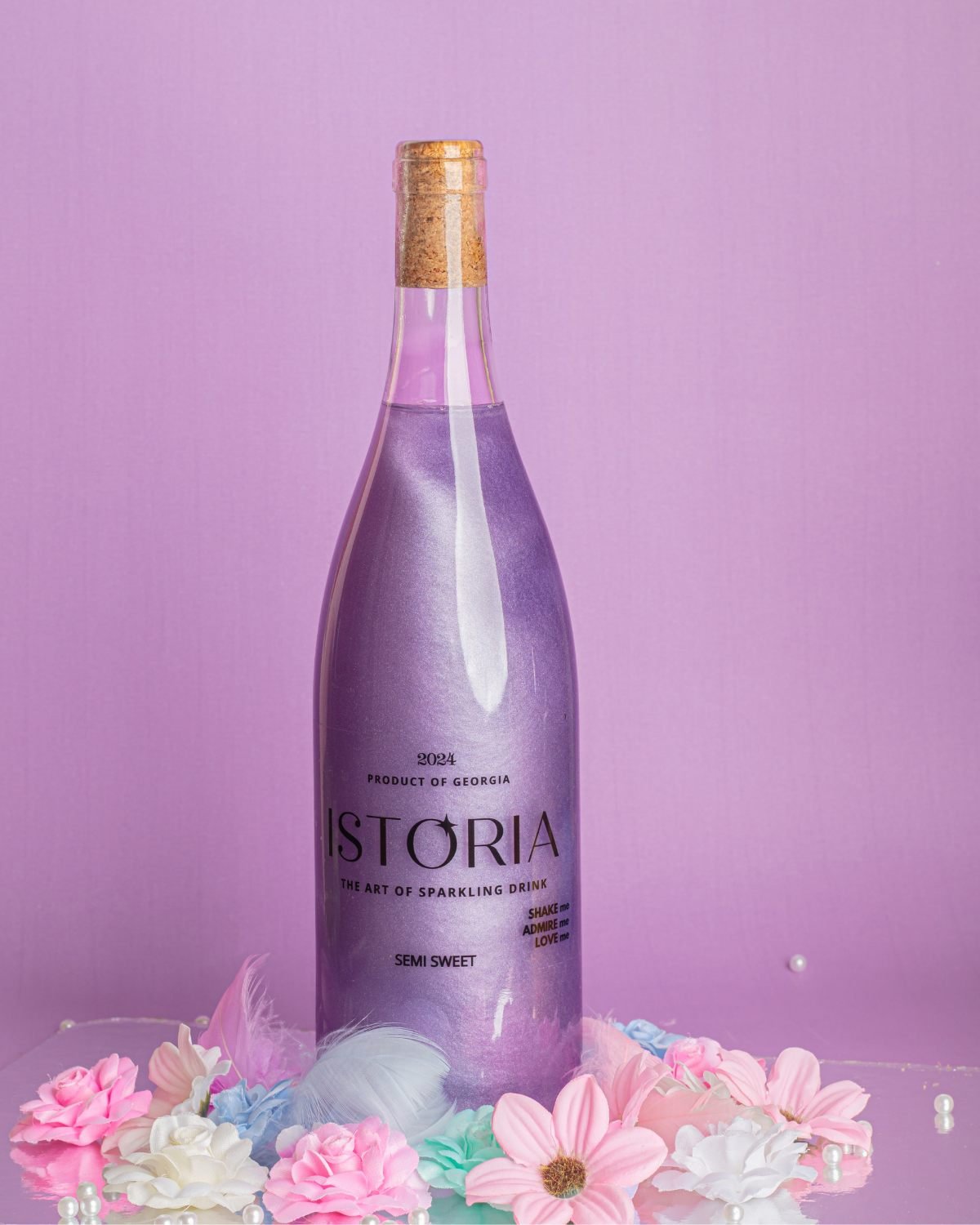 Istoria lavender bottle among flowers